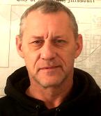 Russell John Manes Jr.